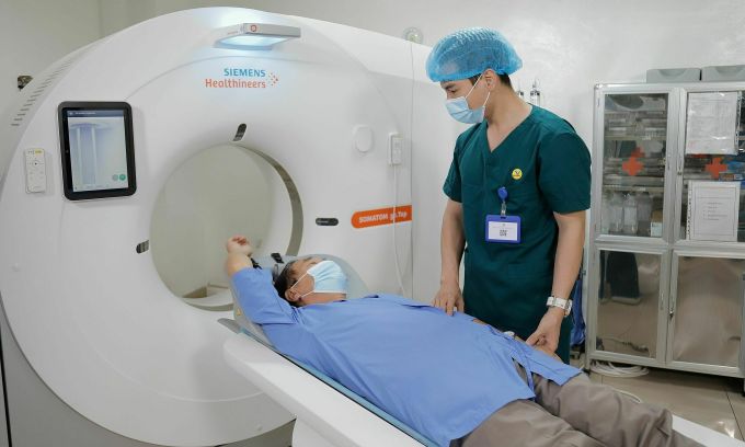 Một bệnh nhân được chụp CT để tầm soát ung thư.  Ảnh: Thu Ngô